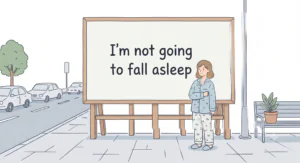 Cartoon of a tired person in pajamas standing beside a large billboard that says, "I'm not going to fall asleep" on a city sidewalk.